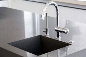 How do you remove calcium deposits from faucets