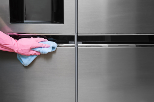 How do you clean a refrigerator step by step