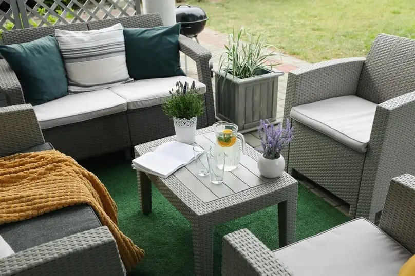 patio furniture setup showing surfaces ideal to illustrate the best way to clean patio furniture